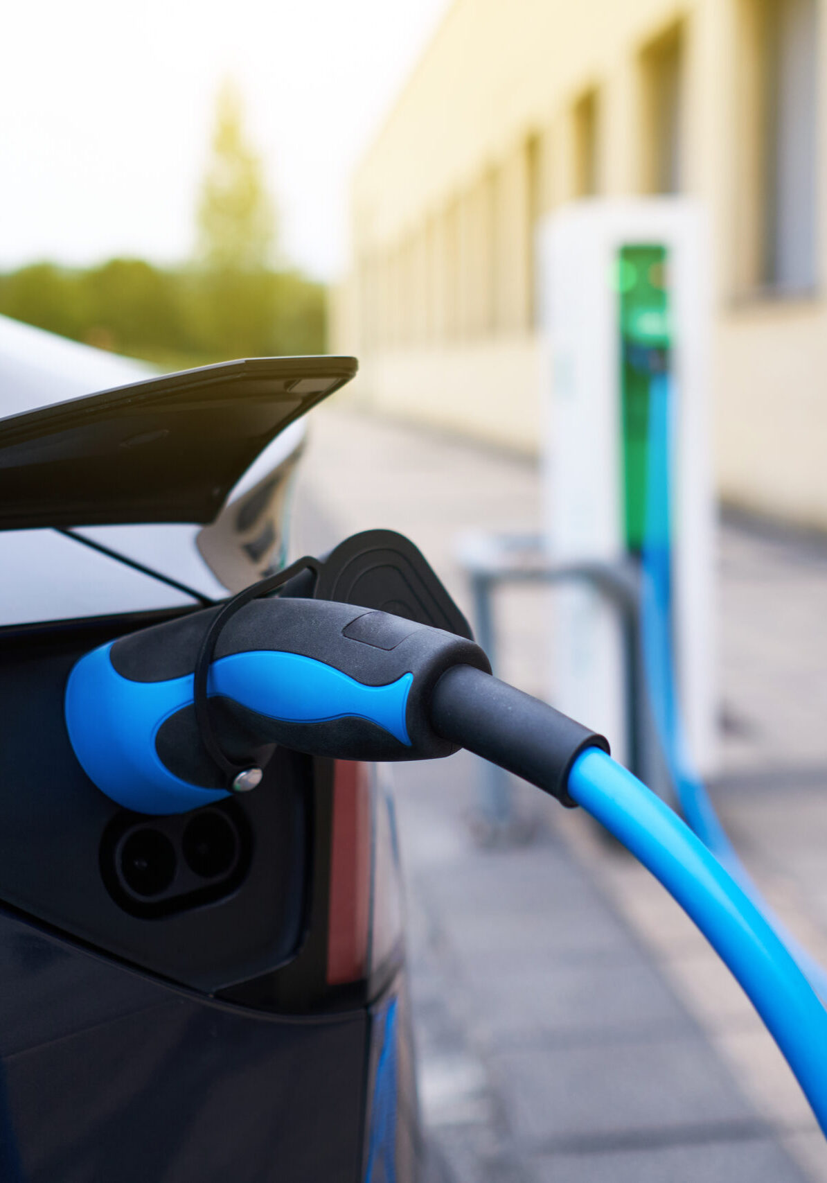 electric car refueling at a charging station